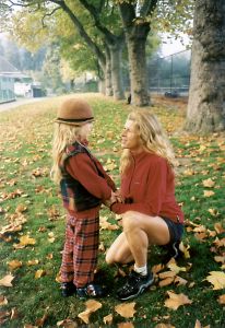 Katherine and son in leaves
